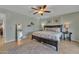 Bright, spacious main bedroom features a neutral color palette, large bed, and stylish furnishings at 9410 N 18Th St, Phoenix, AZ 85020