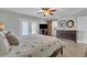 Spacious main bedroom features a ceiling fan, neutral paint, and access to the main bathroom at 9410 N 18Th St, Phoenix, AZ 85020