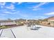 Comfortable rooftop deck area with seating and a table, offering stunning mountain and neighborhood views at 9410 N 18Th St, Phoenix, AZ 85020