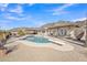 Expansive backyard with an in-ground swimming pool, a diving board, desert landscaping, and mountain views at 9410 N 18Th St, Phoenix, AZ 85020