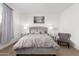 Cozy bedroom with neutral colors and carpet flooring throughout at 9610 E Trent Ave, Mesa, AZ 85212