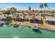 Aerial view of neighborhood homes and the backyard boat docks at 10116 W Bolivar Dr, Sun City, AZ 85351