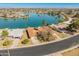 An aerial view of waterfront homes on a lake, complete with personal boat docks at 10116 W Bolivar Dr, Sun City, AZ 85351