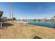 Well-maintained backyard leading to a private boat dock and canal access at 10116 W Bolivar Dr, Sun City, AZ 85351