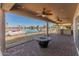Relax on the large covered patio with water views, perfect for outdoor living and dining at 10116 W Bolivar Dr, Sun City, AZ 85351