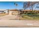 Charming single-story home with well-maintained front yard and attached two-car garage at 10116 W Bolivar Dr, Sun City, AZ 85351