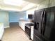 A kitchen featuring new appliances, granite counter tops, wood look floors and a skylight at 10116 W Bolivar Dr, Sun City, AZ 85351
