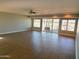 Spacious living room with water views and ample natural light at 10116 W Bolivar Dr, Sun City, AZ 85351