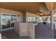 Covered outdoor kitchen and bar area perfect for entertaining at 10116 W Bolivar Dr, Sun City, AZ 85351