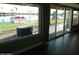 Waterfront property with scenic backyard view through sliding glass doors and windows at 10116 W Bolivar Dr, Sun City, AZ 85351
