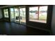 Lake views from inside this home, with access to the patio through sliding glass doors at 10116 W Bolivar Dr, Sun City, AZ 85351