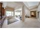 Spacious living room with travertine floors and ample natural light at 10125 N 78Th Pl, Scottsdale, AZ 85258
