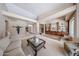 Large living room with elegant decor and custom built-ins at 10125 N 78Th Pl, Scottsdale, AZ 85258