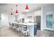 Modern kitchen boasts an island with barstool seating and stainless steel appliances at 11673 N 136Th St # 1005, Scottsdale, AZ 85259