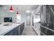 Modern kitchen featuring quartz countertops, stainless steel appliances, and ample cabinet space at 11673 N 136Th St # 1005, Scottsdale, AZ 85259