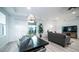 Open-concept living room features dining area and comfortable seating, perfect for gatherings at 11673 N 136Th St # 1005, Scottsdale, AZ 85259