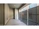 A modern patio featuring geometric privacy screens, providing a stylish outdoor living space at 11673 N 136Th St # 1005, Scottsdale, AZ 85259