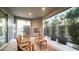 Relaxing outdoor patio complete with stylish seating, fireplace, and retractable shade for comfortable living at 11673 N 136Th St # 1005, Scottsdale, AZ 85259