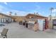 Outdoor poolside area featuring grilling stations and a refreshing drink vending machine at 120 N Val Vista Dr # 253, Mesa, AZ 85213