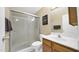 Bathroom featuring a glass-enclosed shower and a wooden vanity at 1222 W Baseline Rd # 114, Tempe, AZ 85283