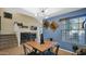 Stylish dining area with modern lighting and views of the living space at 1222 W Baseline Rd # 114, Tempe, AZ 85283