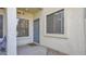 Close up of a condo front door featuring a welcoming door mat at 1222 W Baseline Rd # 114, Tempe, AZ 85283