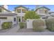 Inviting condo exterior featuring a private balcony and charming landscaping at 1222 W Baseline Rd # 114, Tempe, AZ 85283