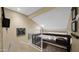 Upper loft area featuring white metal railings and built-in display shelving at 1222 W Baseline Rd # 114, Tempe, AZ 85283