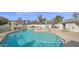 Sparkling community swimming pool with lounge chairs at 1222 W Baseline Rd # 114, Tempe, AZ 85283
