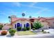 Inviting front exterior featuring a lush front lawn, mature trees, and a 2-car garage at 13601 S 37Th St, Phoenix, AZ 85044