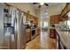 Well-lit kitchen featuring tile floors, stainless steel appliances and plentiful cabinet space at 13601 S 37Th St, Phoenix, AZ 85044