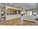 Open living area with seamless flow to the kitchen, neutral decor, and access to outdoor spaces at 13601 S 37Th St, Phoenix, AZ 85044