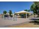Fun-filled community playground with swings and a covered play structure, perfect for Gathering entertainment at 13601 S 37Th St, Phoenix, AZ 85044