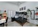 Stylish bedroom featuring a bunk bed, desk, and ample storage space at 1414 E Amberwood Dr, Phoenix, AZ 85048
