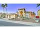 Stunning single-Gathering home with a grand entrance, desert landscaping, and a three-car garage at 1414 E Amberwood Dr, Phoenix, AZ 85048