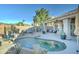 Inviting backyard pool with desert landscaping and comfortable lounge chairs at 1414 E Amberwood Dr, Phoenix, AZ 85048