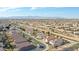 An aerial view of the community shows the location of the property, canal, and neighborhood at 14720 W Edgemont Ave, Goodyear, AZ 85395