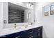 Bathroom with double sink vanity, framed mirror, and stylish lighting at 1625 S 113Th Ave, Avondale, AZ 85323