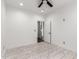 Bright bedroom features a ceiling fan and marble tile flooring at 1625 S 113Th Ave, Avondale, AZ 85323
