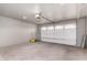 Garage with concrete flooring and bright lighting at 1625 S 113Th Ave, Avondale, AZ 85323