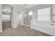 Bathroom featuring a separate shower and tub for a spa-like experience at 17388 W Elaine Dr, Goodyear, AZ 85338