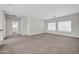 Bright bonus room features neutral carpet, recessed lights and an airy feel at 17388 W Elaine Dr, Goodyear, AZ 85338