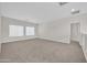 Spacious bonus room with plush carpet and lots of natural light at 17388 W Elaine Dr, Goodyear, AZ 85338