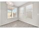 Bright breakfast nook features tile flooring and lots of natural light at 17388 W Elaine Dr, Goodyear, AZ 85338