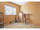 Cozy bedroom with natural light, neutral carpet, and a pet play area at 17722 N 183Rd Ave, Surprise, AZ 85374