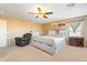 Bright main bedroom featuring carpet flooring, neutral walls, and windows with lots of natural light at 17722 N 183Rd Ave, Surprise, AZ 85374