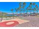 Community playground featuring swings, picnic areas, and lake views at 18207 W Hope Dr, Goodyear, AZ 85338