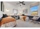 Shared bedroom with two twin beds and white board and batten walls at 18429 W Mohave St, Goodyear, AZ 85338