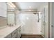 A beautifully upgraded bathroom with a modern glass-enclosed shower and sleek fixtures at 1929 S Follett Way, Gilbert, AZ 85295