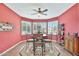 Bright breakfast nook with large windows providing natural light and a view of the outdoors at 19701 N Hidden Ridge Dr, Surprise, AZ 85374